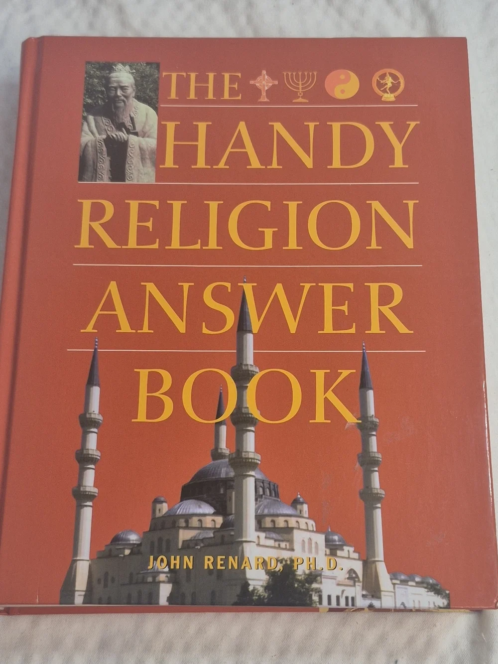 The Handy Religion Answer Book by John Renard - Orange Hardcover
